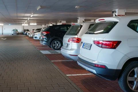 Parked in parallel precision at the underground garage of the local shoppin.. Stock Photos