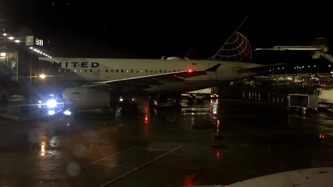 Parked Plane Preparation at Night Time Lapse Stock Footage 125348598