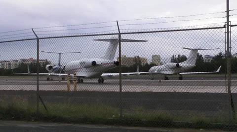 Parked Private Jet Planes 1 on Runway HD Stock Footage 1042199