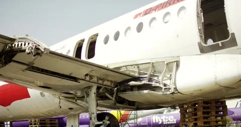 Parked Regional Airliner with Open Doors on the Apron, Low Angle, Wide Shot Видео 340311925
