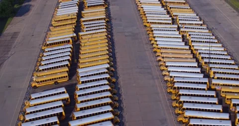 Parked School Buses Drone Pan 2 Stock Footage 138072234
