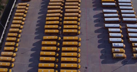 Parked School Buses Drone Pan (5) Stock Footage 138072272