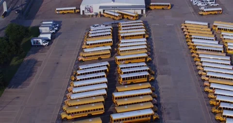 Parked School Buses Drone Pan 8 Stock Footage 138072322