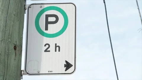 Parking allowed for 2 hours h white green black vertical rectangle sign Stock Footage 251357695