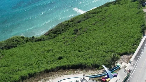 Parking area and structures on a coastal headland, aerial view Stockbeeldmateriaal 278369755