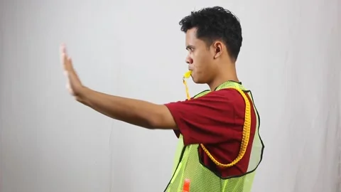 Parking attendant blew the whistle and signaled the stop sign Video stock 319881663