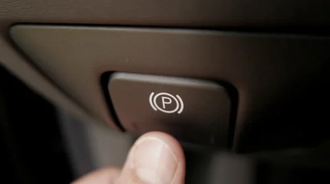 Parking break turned on inside modern car (Vovlo V70) Video stock 53852782