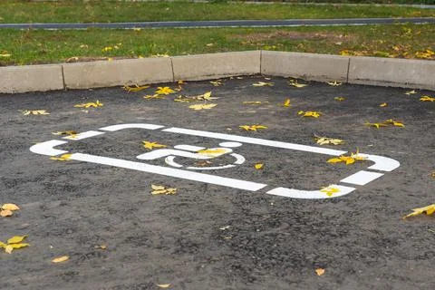 Parking for the disabled. An empty parking space for people with disabilities Stock Photos