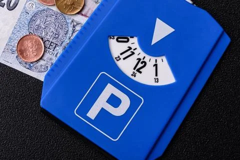 A parking disc, permit, or ticket for measuring time and paying municipal s.. Stock Photos