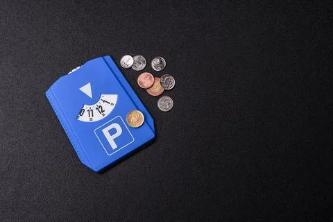 A parking disc, permit, or ticket for measuring time and paying municipal s.. Stock Photos