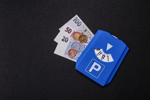 A parking disc, permit, or ticket for measuring time and paying municipal s.. Stock Photos