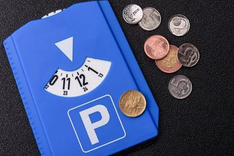 A parking disc, permit, or ticket for measuring time and paying municipal s.. Stock Photos