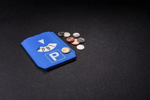 A parking disc, permit, or ticket for measuring time and paying municipal s.. Stock Photos