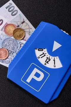 A parking disc, permit, or ticket for measuring time and paying municipal s.. Stock Photos