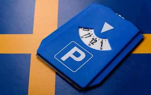 A parking disc, permit, or ticket for measuring time and paying municipal s.. Stock Photos