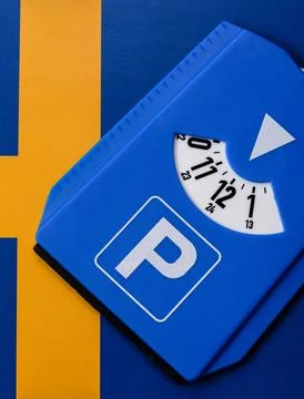 A parking disc, permit, or ticket for measuring time and paying municipal s.. Stock Photos