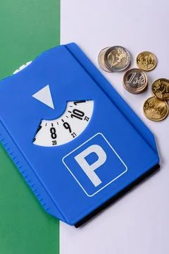 A parking disc, permit, or ticket for measuring time and paying municipal s.. Stock Photos