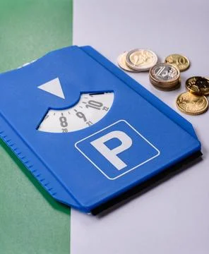 A parking disc, permit, or ticket for measuring time and paying municipal s.. Stock Photos