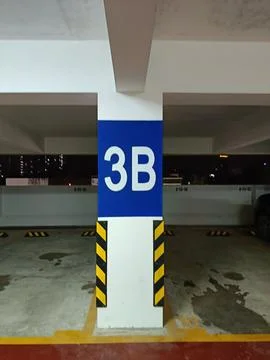 Parking garage level marked Stock Photos