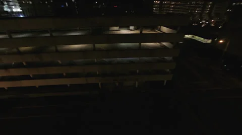 Parking Garage at night, Aerial tracking shot Stock Footage