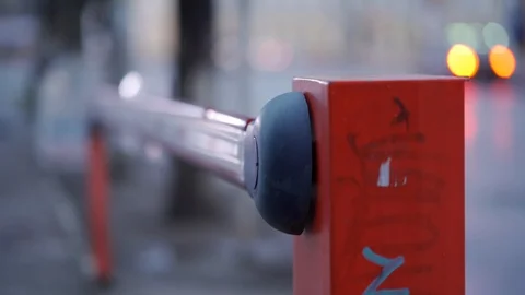 Parking lot automatic road boom barrier system gate on a city street. Stock Footage 125086872