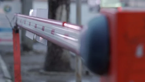 Parking lot automatic road boom barrier system gate on a city street. Stock Footage 126167154