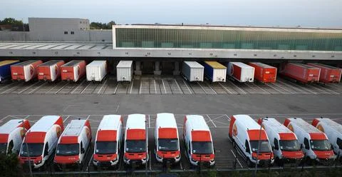 Parking lot of a PostNL sorting center Stock Photos