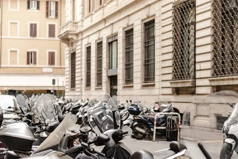 Parking in the small streets of Rome. Stock Photos