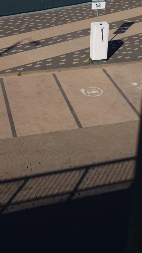 Parking space with shadows. Brightly lit parking bay with shadows and geometric Stock Footage 332874484