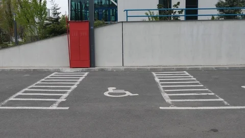 Parking spot for persons with disabilities Video stock 106028408