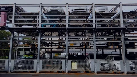 Parking tower, in Japan it is a problem to find a space for the car. Stock Footage 138868969
