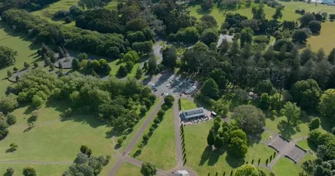 Parkland with buildings and pathways. Cornwall Park, Auckland, New Zealand Stock-Footage 295018599