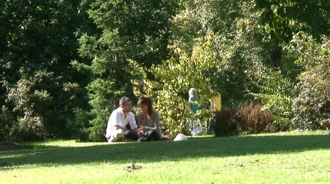 Parklife: Attractive Young Couple in Park Stock Footage