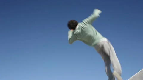 Parkour Athlete Executes Backwards Flip - Slow Motion Stock Footage 22119050