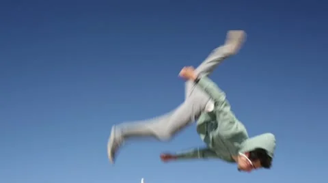 Parkour Athlete Performs Back Flip Real Time Stock Footage 22118116