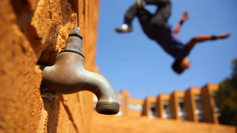 Parkour back flip broken tap in foreground 스톡 동영상 136219996