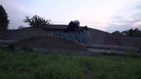 Parkour Layout Gainer Flip off of Wall in Slow Motion Stock Footage 80072254