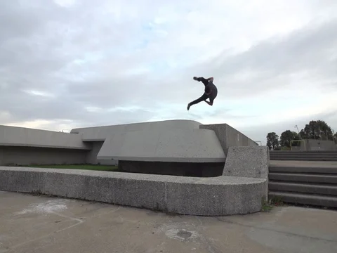 Parkour Side Flips in Urban Setting Stock Footage 80164425