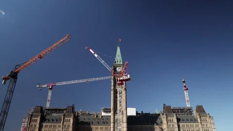 Parliament building, Centre Block under renovation with working cranes in Ottawa Stock Footage 319611592
