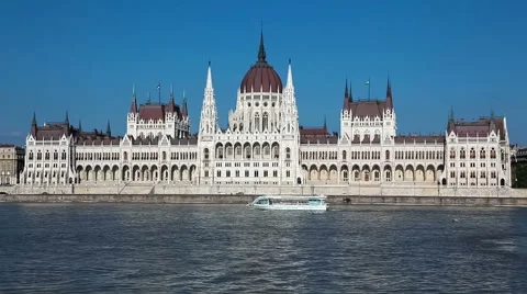 Parliament Building on Danube river with boat in Budapest 動画素材 49666341