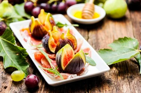 Parma Ham and figs Stock Photos