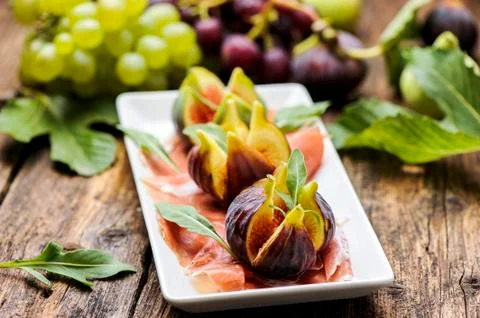 Parma Ham and figs Stock Photos
