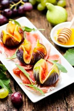 Parma Ham and figs Stock Photos
