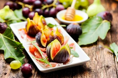 Parma Ham and figs Stock Photos