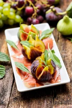 Parma Ham and figs Stock Photos