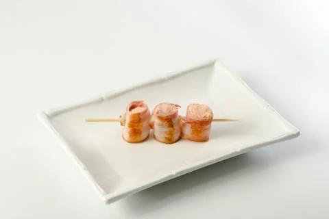 Parma ham prosciutto on stick Stock Photos