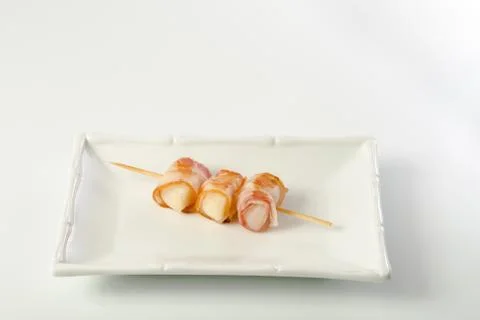 Parma ham prosciutto on stick Stock Photos