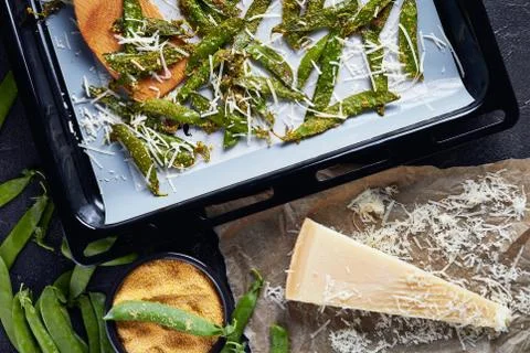 Parmesan and cornmeal breaded Snap Peas, close-up Stock Photos