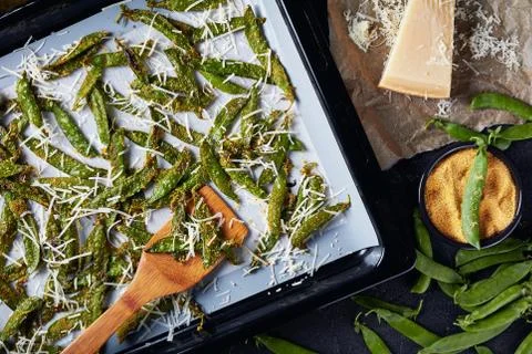 Parmesan and cornmeal breaded Snap Peas, close-up Stock Photos