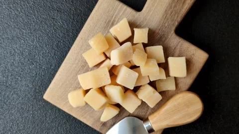 Parmesan cheese cubes for pasta, salads, and other Italian dishes. Parmesan chee Stock Footage 333465638